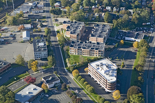 This aerial shot shows the area where an expanded office complex and attractive townhouses near the Fairfield, NY Metro North train station will be.